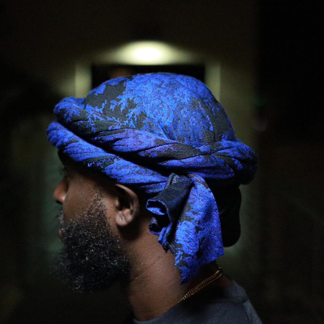 Black male turban with blue flowers 